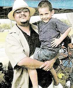 Oscar Silva Jr with son Fabian